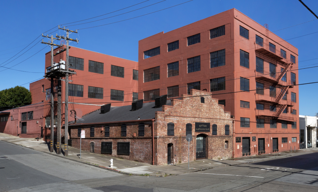 Marcy Wong Donn Logan Architects with Peter Logan Architecture + Design were challenged to transform a former paint and lacquer manufacturing facility, described as a “rat maze” of partitions and rooms with two mezzanines and very low head heights, into speculative space.