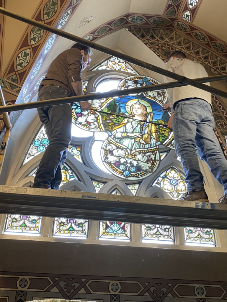 Each window was carefully removed from its frame with meticulous documentation tracking its original location. The windows were soaked, cleaned, repaired and polished. Wooden window frames were repaired and cleaned.