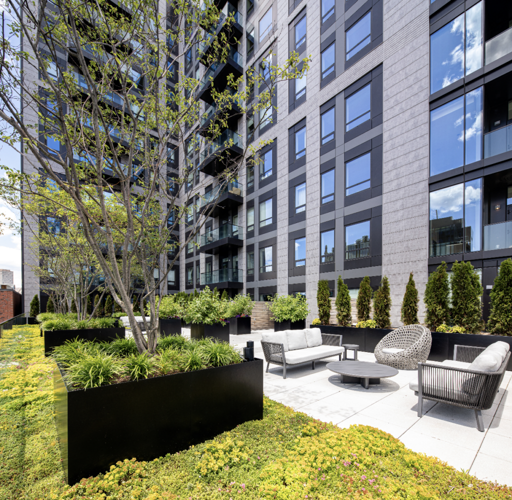 The landscaped terrace on the posterior of the building provides an oasis of green space amid a dense urban environment for the residents of 100 Shawmut. 