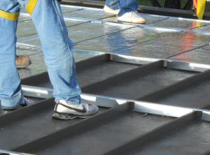 sub-purlins create a cavity in which to place polyiso insulation board 