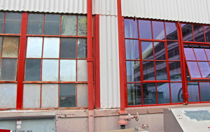 Pearl Harbor Hangar before (left) and after (right) its window replacement.