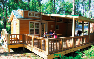 Lake Rudolph Campground & RV Resort features 53 cabins with decks that guests find appealing.