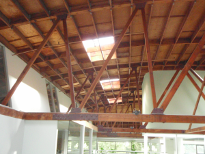 A shot from the inside of the facility, showing the existing truss system to which the Silverback Solar racking system had to be attached.