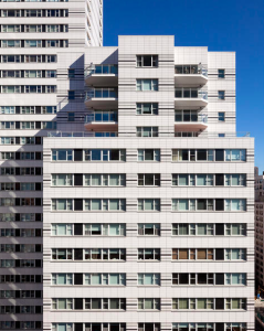 A terracotta rainscreen system replaced the failing white 1960s masonry on this Manhattan residential building.