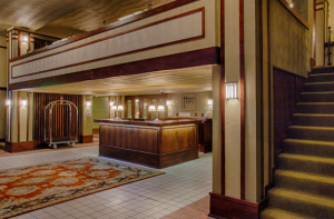 The design and construction team wondered whether the lobby’s mezzanine had ever existed. It appeared in Frank Lloyd Wright’s original drawings but not in the interior photograph from the 1930s. After some demolition, the team discovered the original beam pockets. PHOTO: Aaron Thomas