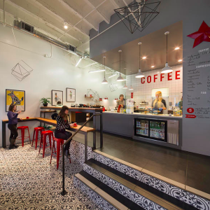 Convenient grab-and-go food and beverage offerings, such as Modern Coffee, are increasingly popular in hotels, making the most efficient use of the floorplate. PHOTO: Arcsine