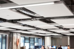 Rockfon acoustic stone wool ceiling systems are positioned strategically throughout the workspace to enhance productivity.