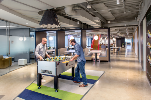 Throughout the three floors of Match.com’s headquarters, informal spaces and a game room lend a relaxed aesthetic to the workplace that invites employees to unplug. PHOTO: Thomas McConnell