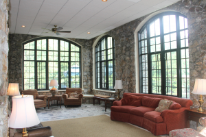 The MONTREAT CONFERENCE CENTER, Montreat, N.C., required more than 600 windows in approximately 25 different sizes. To meet aesthetic requirements, combinations of fixed and outswing casement windows, along with radius transom windows from Kawneer, were used to replicate the appearance of the original windows. PHOTOS: Progress Photo, courtesy Kawneer
